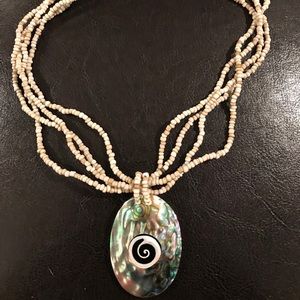 Necklace with beads and shells